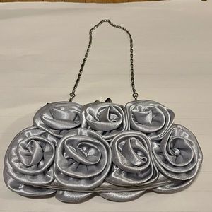 3/$20. Silver rosette occasion handbag